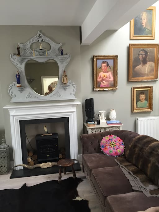 Antique mirrors, velvet sofas, oil paintings and fur throws add a cosy vibe