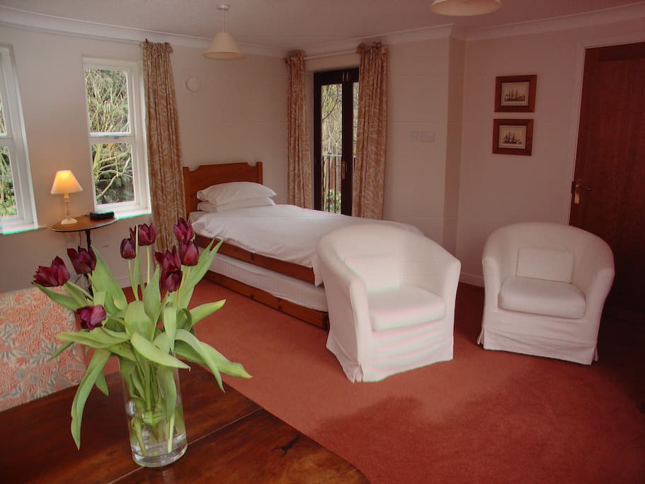 Twin beds that also convert to a double bed