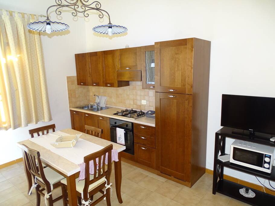 Sala da pranzo con cucina
