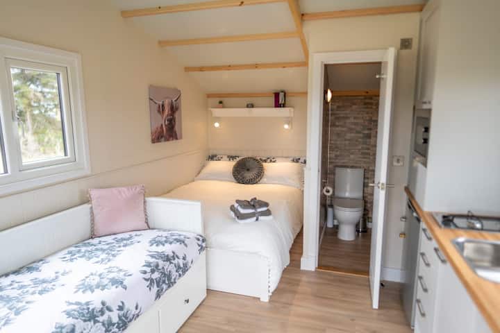 Pull out double sofa bed and double bed in the corner