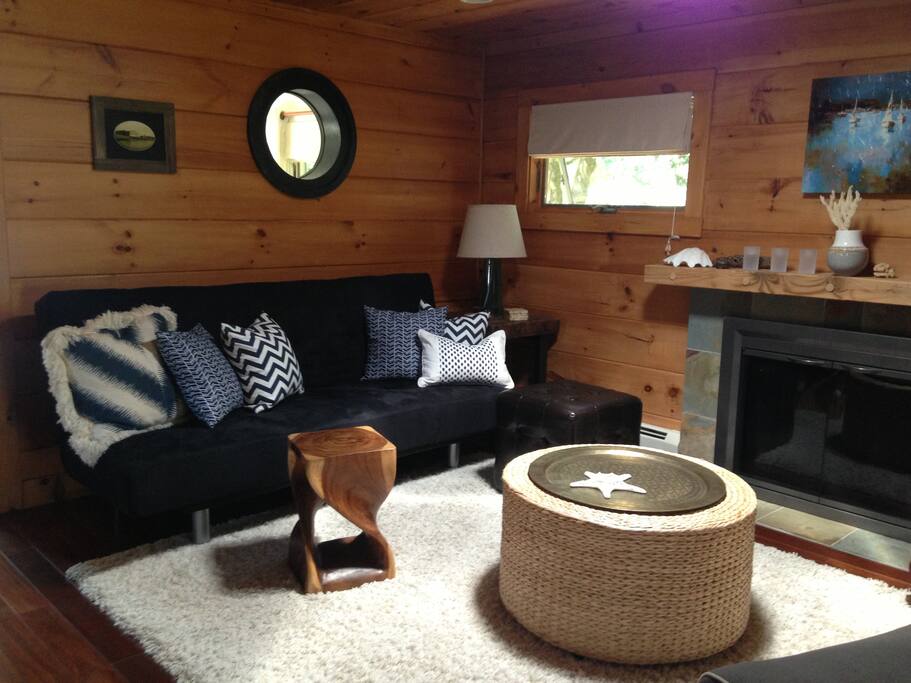 Living room with skylight. The porthole has a view of the water too!