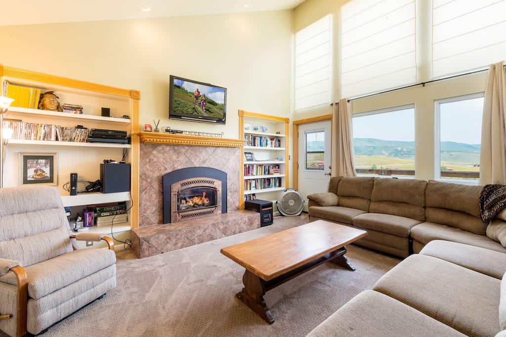 A 42" Sony flat screen TV sits above a gas fireplace in the living room.