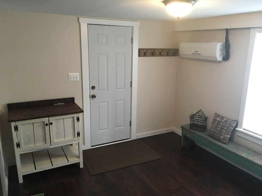 Ground floor entrance, sitting area, 1/2 bath, laundry