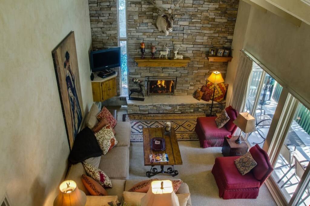 Return to this mountain chic retreat with your family and friends. Enjoy the vaulted ceilings and large windows (only available in select units).