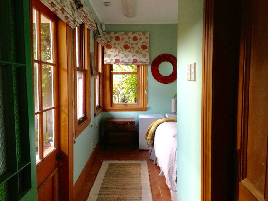 The compact room has garden views where you can sometimes see native birds.