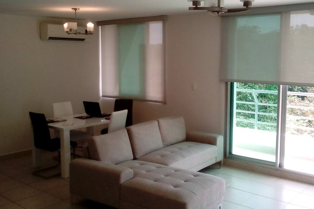 Dinning room, sofa over looking the rainforest