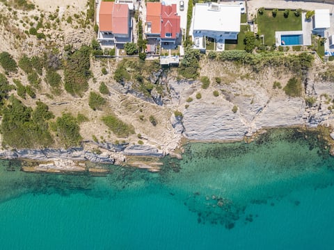 Successful Airbnb property: A White Cliffside Studio in Dubrava, Island Pag in Grad Pag