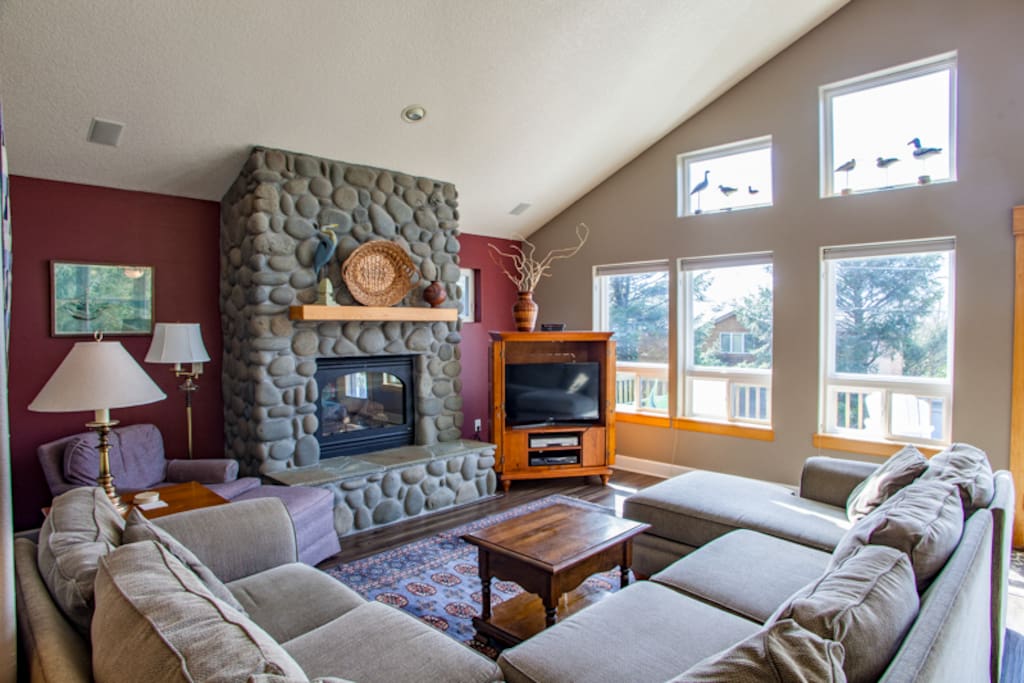 Living room with wood flooring and gas fireplace