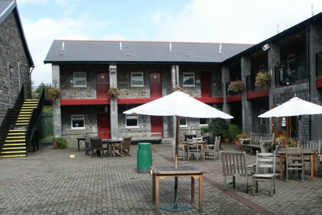 Courtyard & Rooms