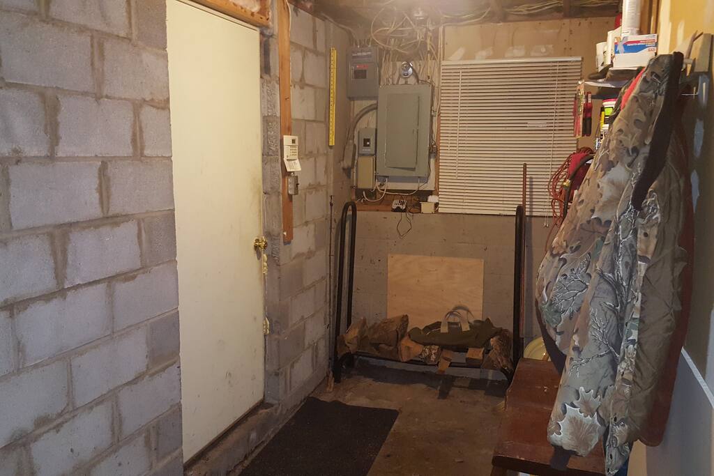 Mud room and wood rack.