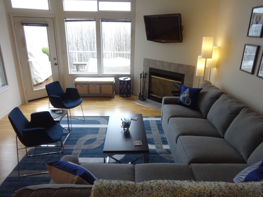 Living room opens up to north-facing deck.
