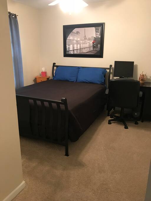 Bedroom #2: Queen bed and desk.