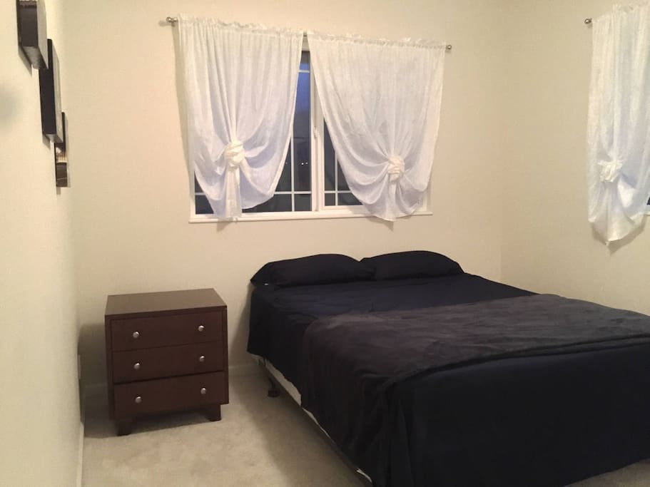 second bedroom with queen size bed