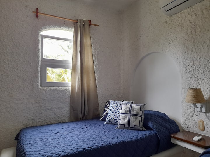 Secondary room with two beds: a semi double and an imperial one.