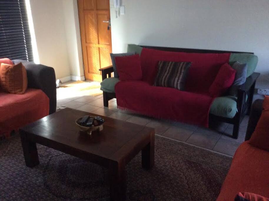 Living room with a sleeping couch.