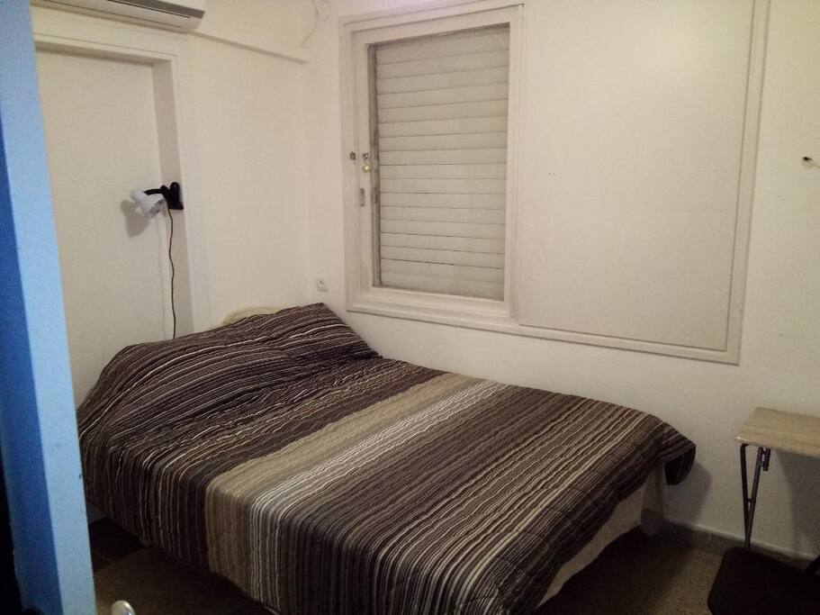 A cosey room with a Double Bed and cupboard space