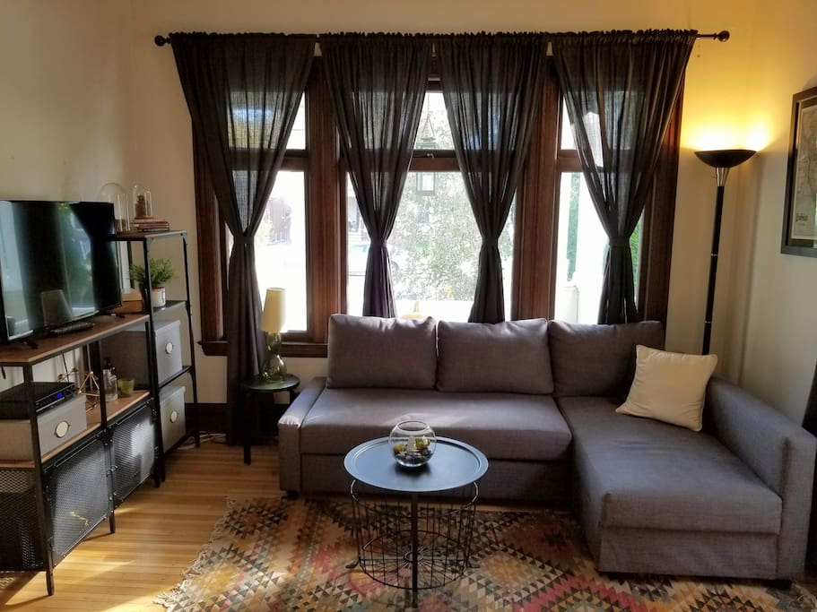 This living room couch also converts to a full size bed.