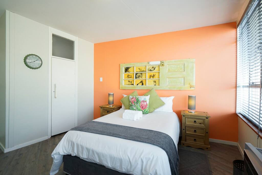 Main bedroom with aircon. Towels also provided.