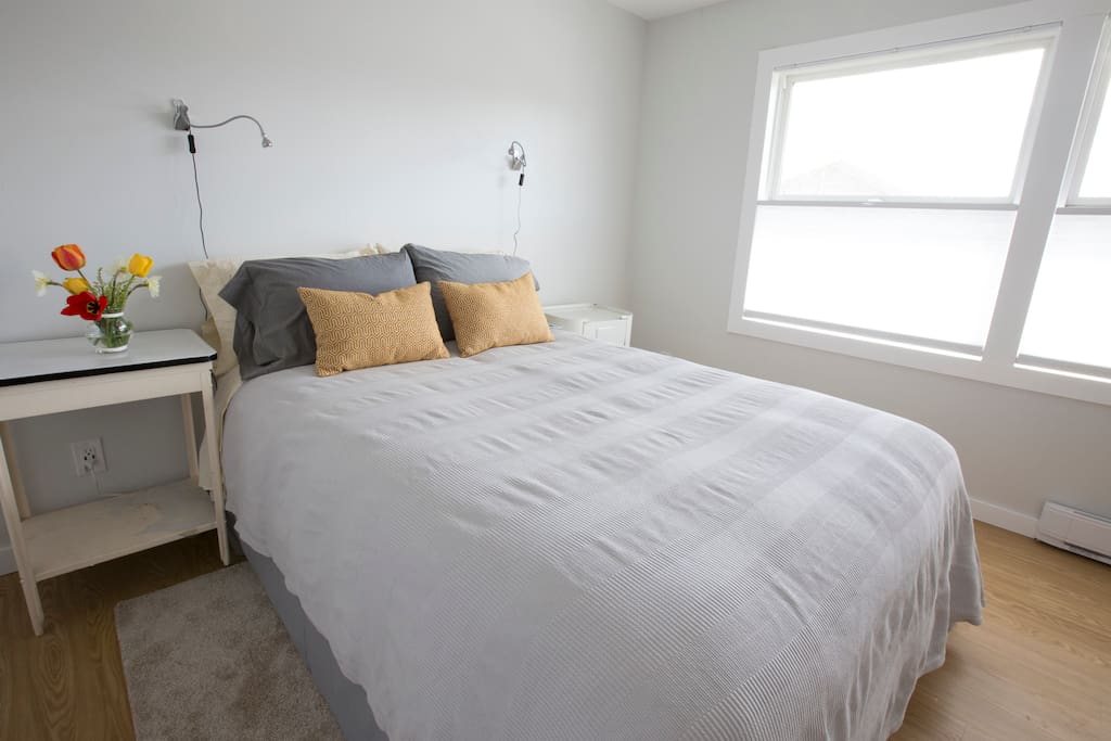 Simple designed master bedroom. Artwork still needs to be found and hung...:)