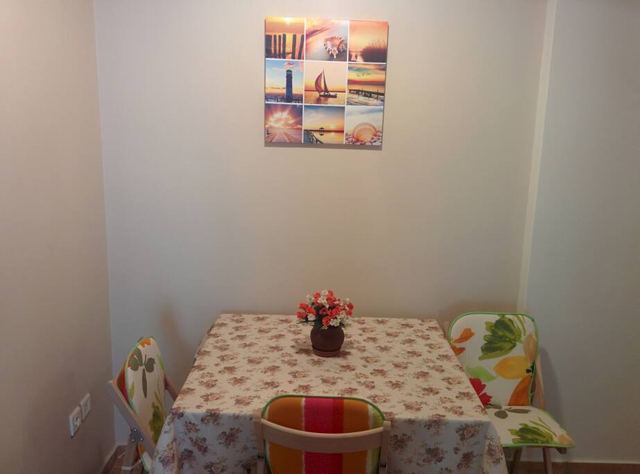 Dining area. Table opens up to have all guests sit together
