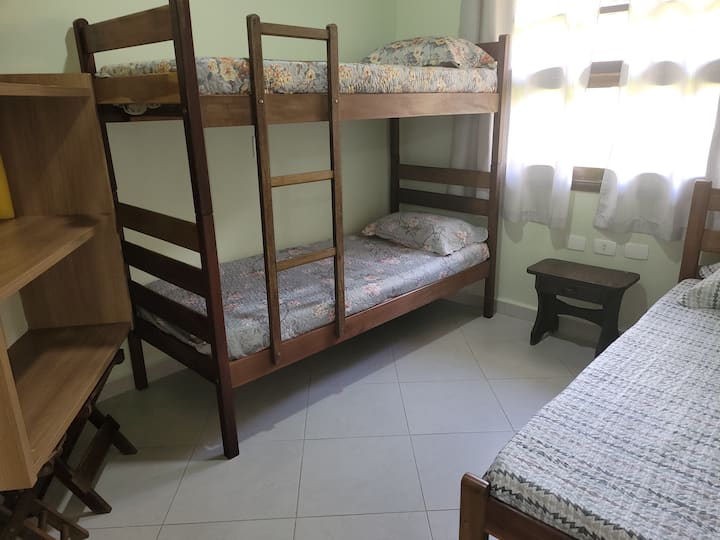 Bedroom with bunk bed, trundle bed and air-conditioning 