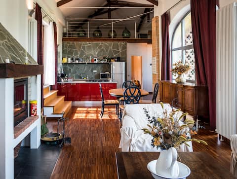 Relax in a spacious apartment above a winery