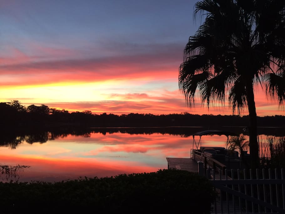 Sunrise . View from deck with pontoon boat.