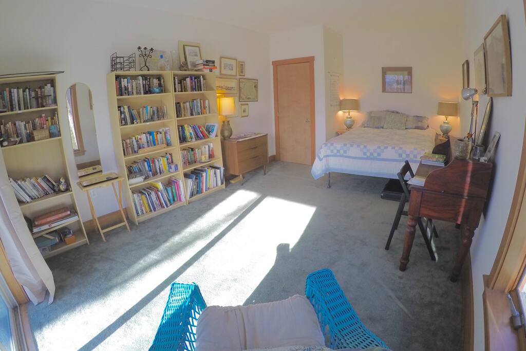 Bedroom with desk, bed, chest of drawers, etc.