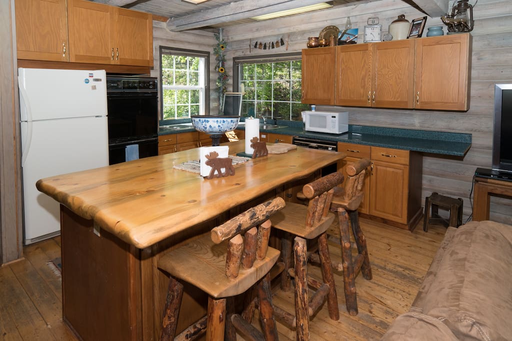 Main floor kitchen sits on the left when you walk through the front door.