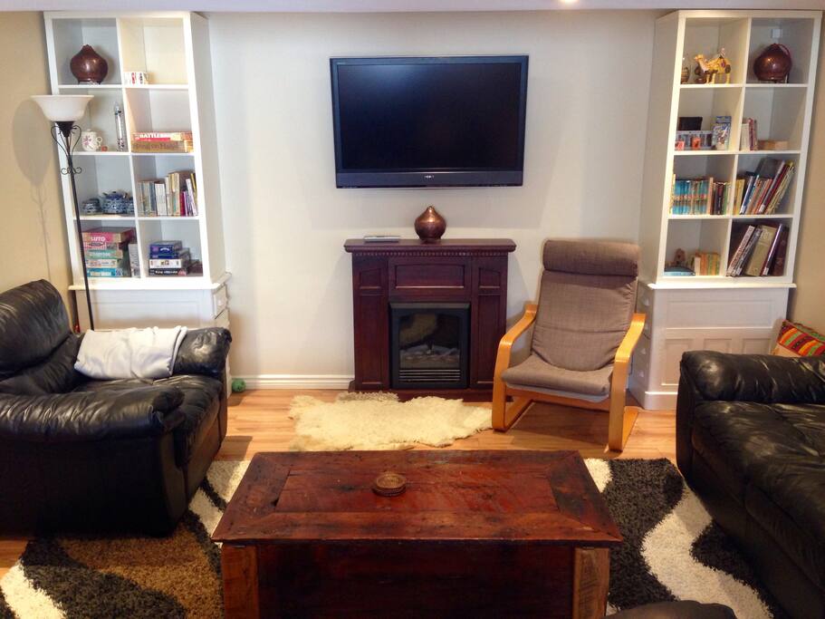 Livingroom. Comfy leather couches. HDMI and VGA hookups for your Laptop