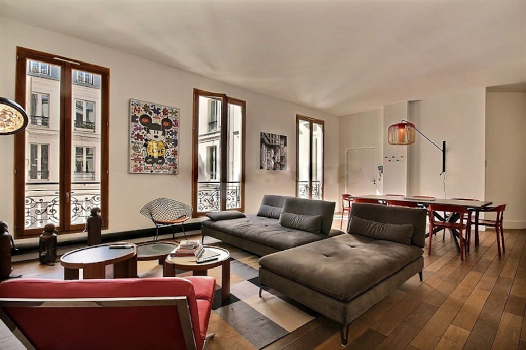 Living
The 46 square meters living room has 3 double glazed windows facing courtyard . It is equipped with : dining table for 8 people, sofa, coffee table, cable, TV, desk, armchair, built-in shelves, built-in wall closet, hard wood floor.