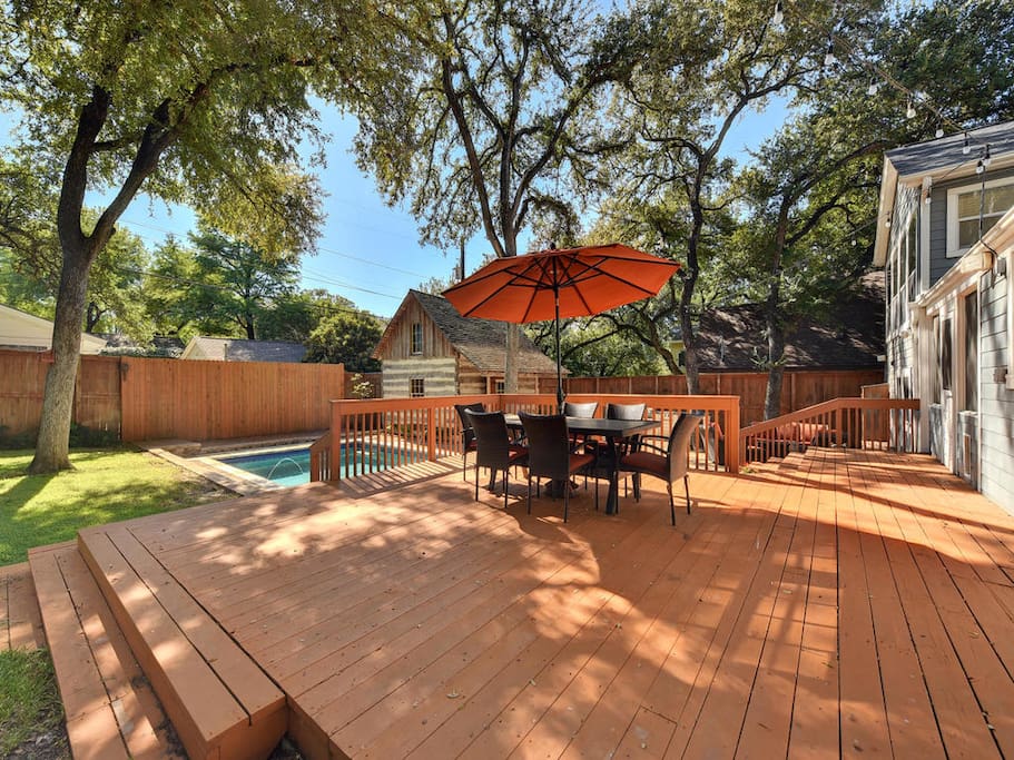 Spacious deck overlooking the pool.