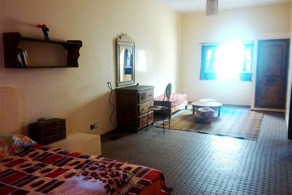 Spacious and luminous bedroom with double bed