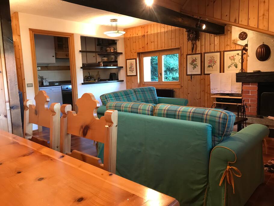 Living room with kitchen in the background