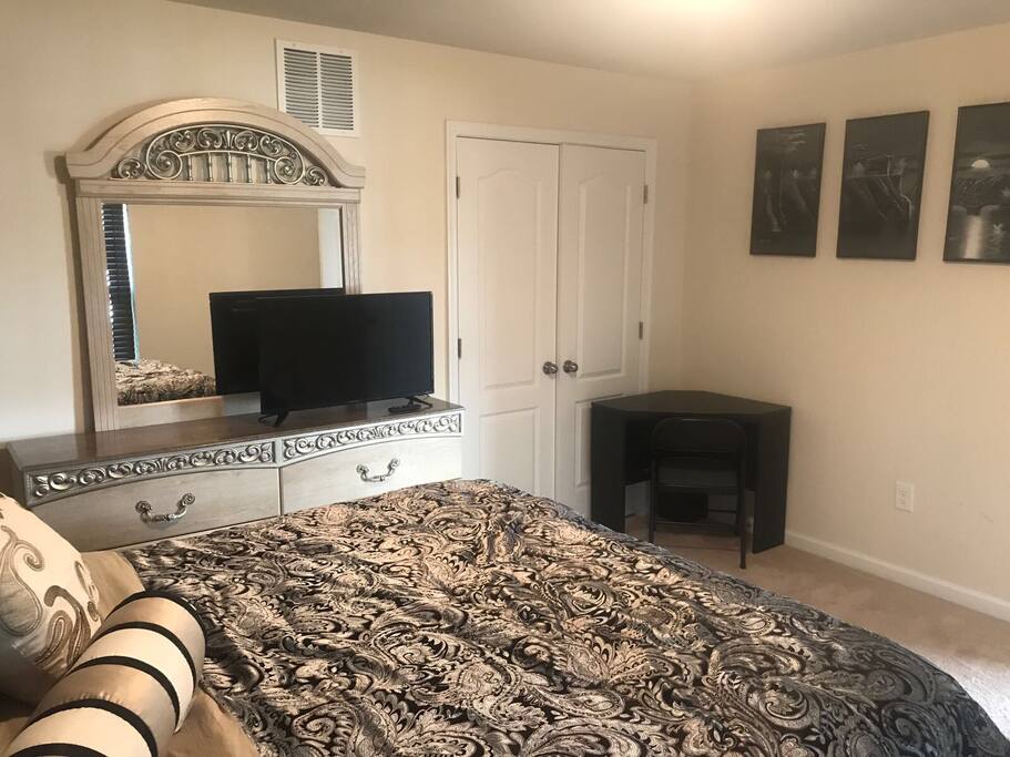Corner desk with a chair and plenty of closet space