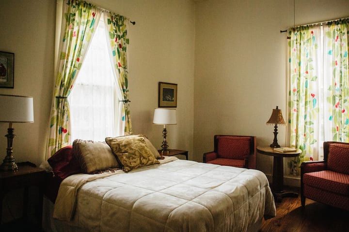 Bedroom 2: Queen bed and a pull out cot in the closet
