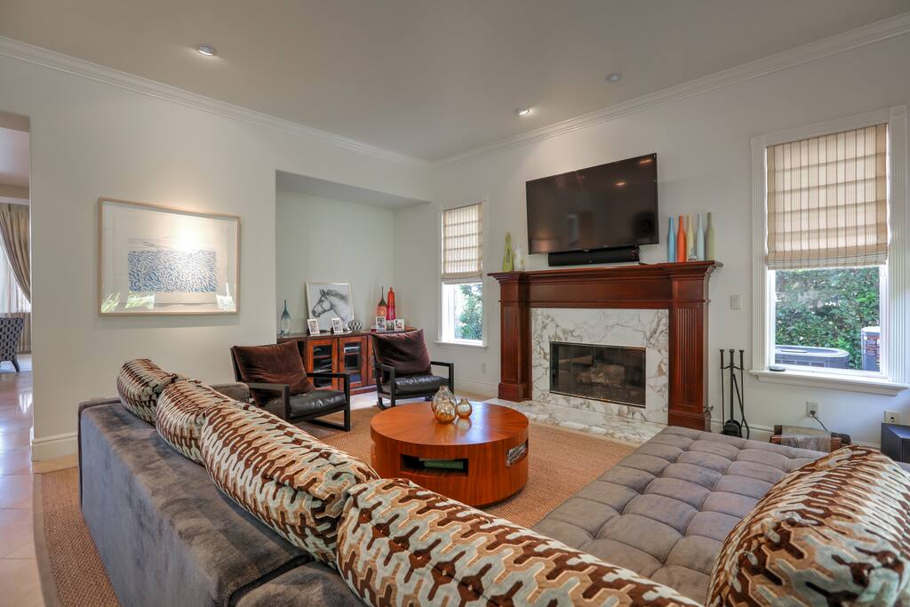 The Family Room also features a gas fireplace and large TV