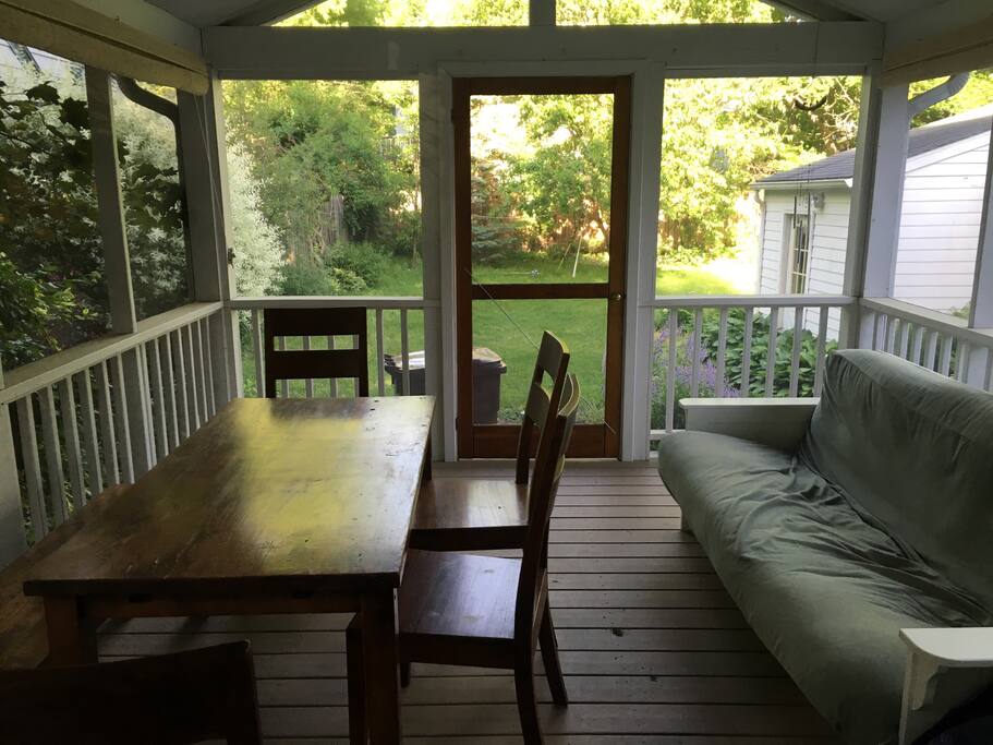 Fully screened-in back porch.