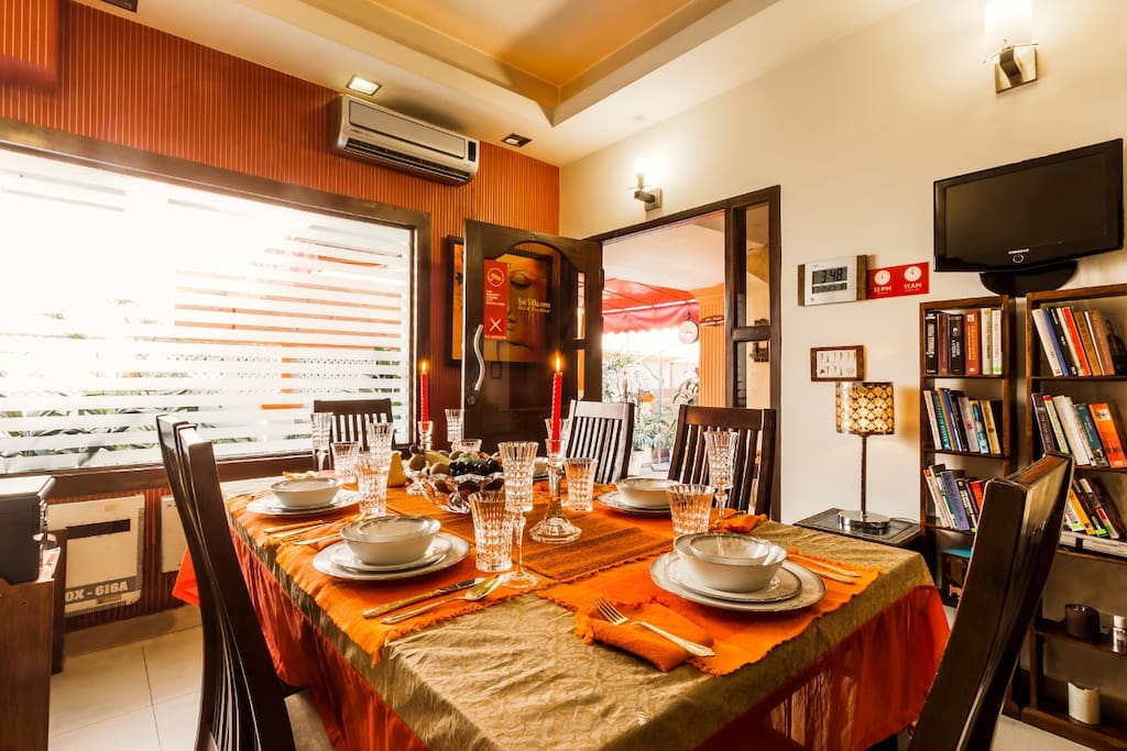Sunlight, books, AC, TV and lounge to relax or to have meals!