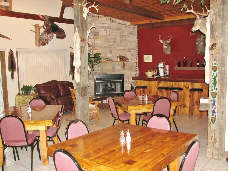 The great room with stone fireplace.