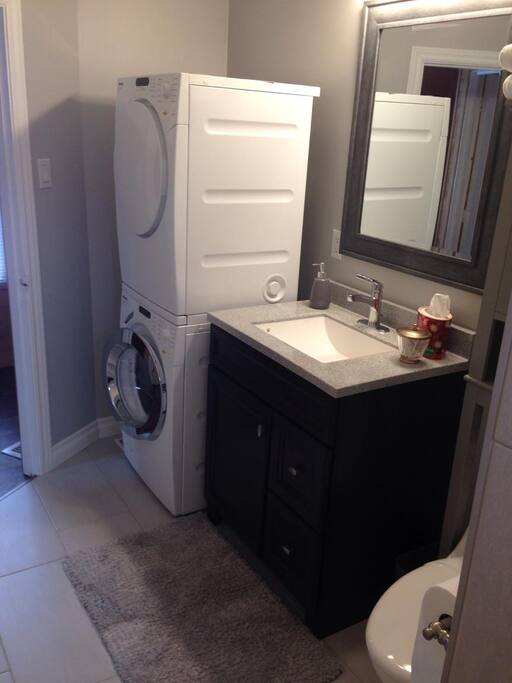 Modern Bathroom with washer and dryer