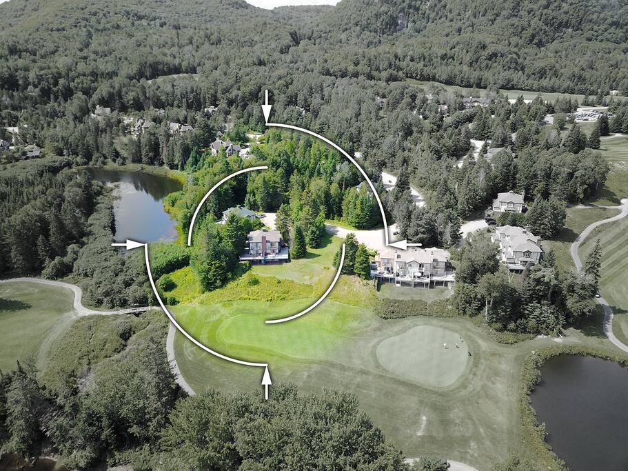 Aerial video of our 2-unit townhouse with brown roof, overlooking 7th hole of LaBete golf course