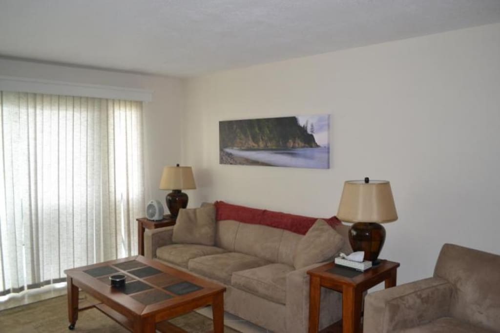 Living room and sliding glass doors to balcony
