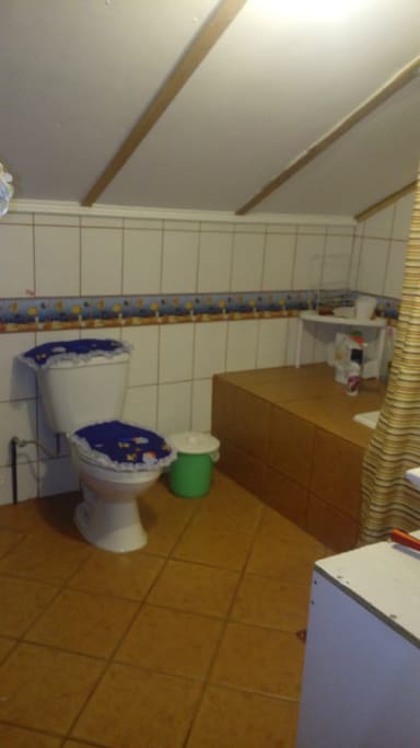 baño con tina y ducha