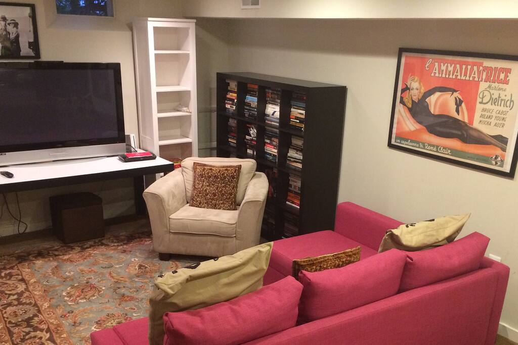 Sitting area, big screen TV with DVD player, no cable.