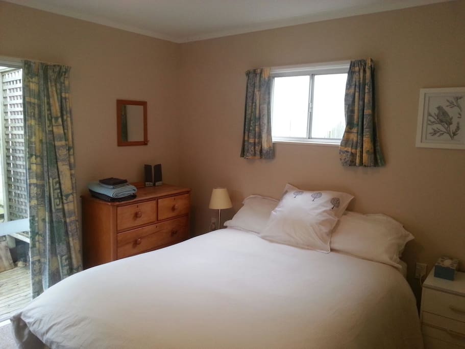 Large double bedroom with queen sized bed.