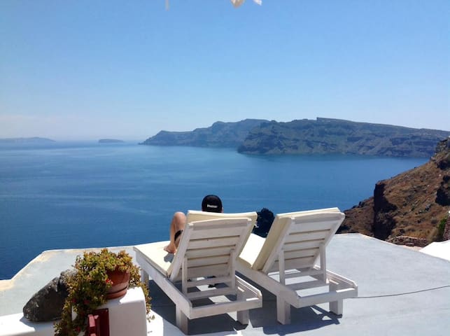 Cave house Oia Caldera Amazing view