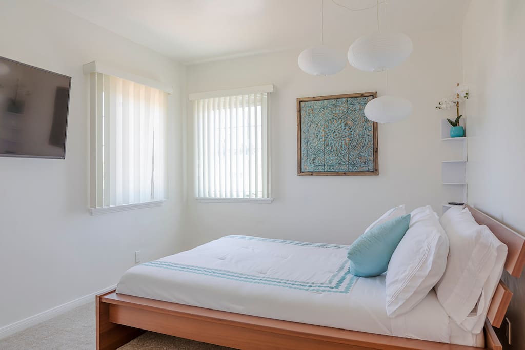 This bedroom boasts Smart TV & great closet space for longer stays. Unpack & make yourself at home.
