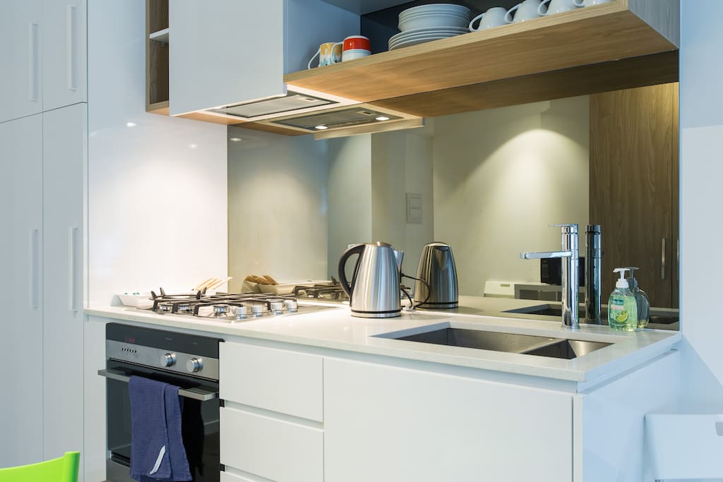 Modern kitchen with complete utensils and dishwasher!