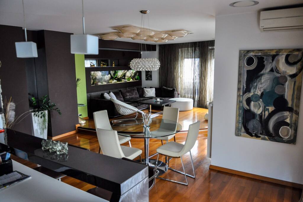 Dining table and living room (view from the kitchen)